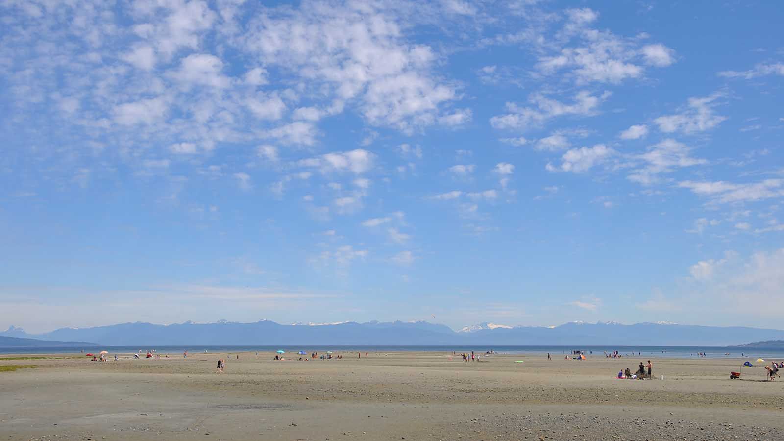 Families relax on a summer's day in Parksville, BC Canada